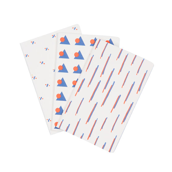 Set of three blue and red patterned notebooks