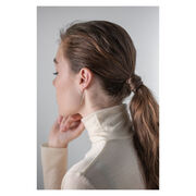 Gold and silver thin wire earrings, in a crossed design on model
