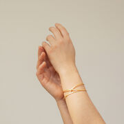 Sculptural embolic cuff bracelet