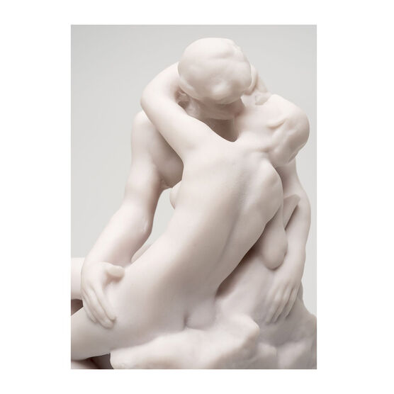 White miniature stature of a couple kissing 