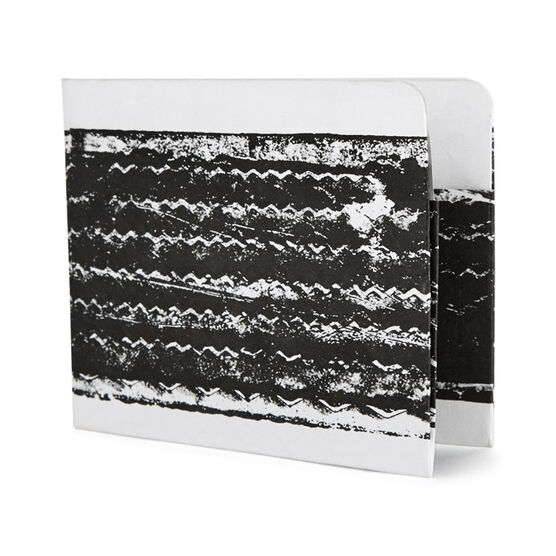 Tire print wallet inspired by his artwork Tire Print, 1953. Tate