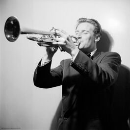 Nigel Henderson: A musician performing on a trumpet
