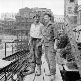 Nigel Henderson: Two construction workers on a construction site