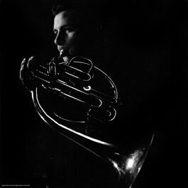 Nigel Henderson: A musician performing on a French horn