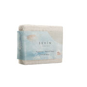 White clay soap with a card band featuring a detail from Auguste Rodin's Femme nue