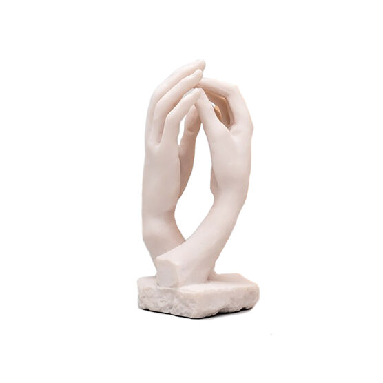 Miniature sculpture replica of two intertwined hands