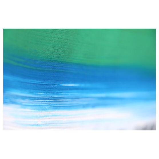 Close up of painted green, blue and white stroke