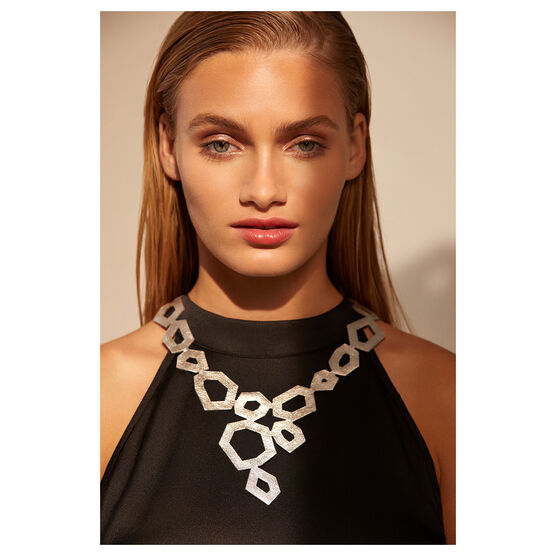 Silver leather necklace on a model