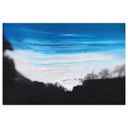 close up of white and blue brushstroke against black t-shirt